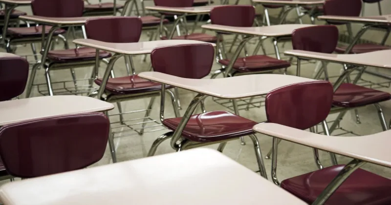1,339 teachers were each shown a student's exercise with a wrong mark already on it, and the ones told an algorithm had set the mark finished further from the fair grade than the ones told a colleague had — but only where the mark was too harsh, with