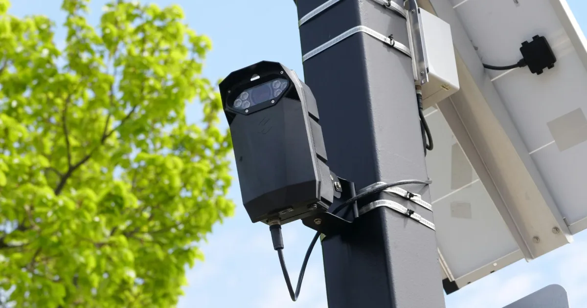 Twelve microphone-equipped cameras on New York streets logged 15,994 loud-vehicle events in 2025 and produced 1,691 summonses carrying $1,472,265 in penalties, of which $308,229 was actually paid, and thirteen of the twenty-five cameras the city's ow